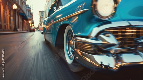 Vintage blue car driving through urban area. Suitable for automotive and cityscape themes