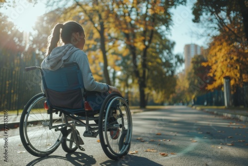 Woman in Wheelchair on City Street © nik_yurginson