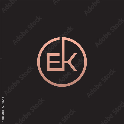 EK monogram logo inside gold circle frame.