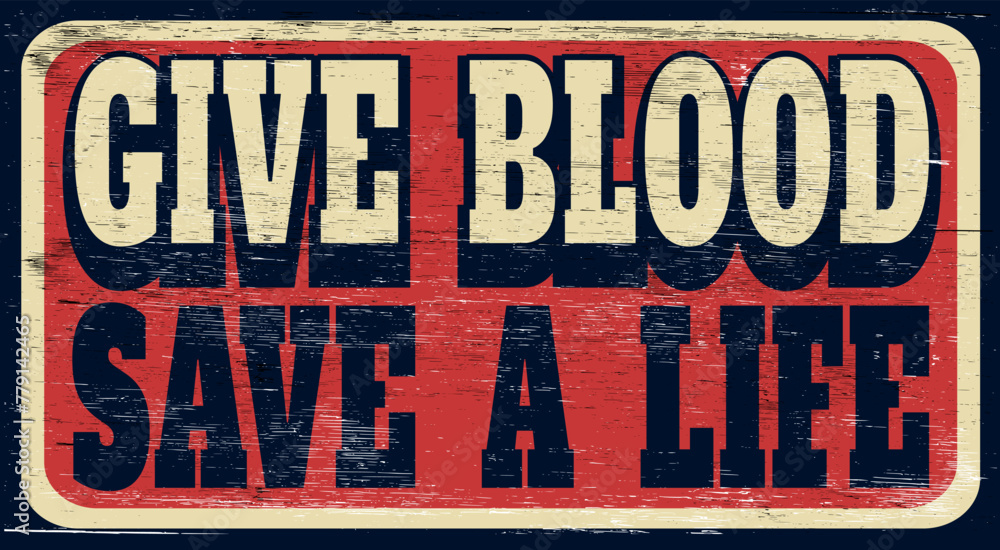 Fototapeta premium Aged and worn give blood save a life sign on wood