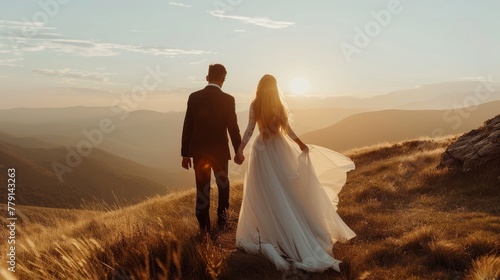 Bride and groom at a mountain overlook, concept of eloping and destination weddings photo