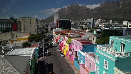 View of the colorful Bo-Kaap in Cape Town, South Africa. A popular daytime destination, hillside Bo-Kaap is known for its narrow cobbled streets lined with colorful houses