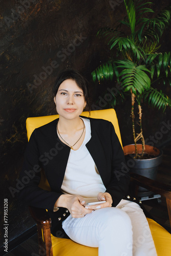 Portrait of caucasion successful, pretty, cute busnesswoman in casual outfit photo