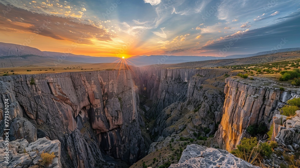 Stunning canyon panorama at sunset, showcasing vibrant hues and nature's artistry. Explore the breathtaking Tasyaran canyon in Turkey's vast valley.