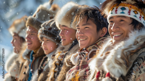 Group of young Inuit people smiling in traditional attire. photo