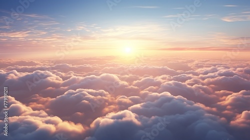 Beautiful sunset view over the clouds. Flight in the sky at sunset view from airplane window. © Alpa