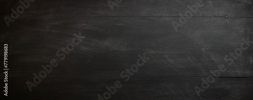 Black blackboard or chalkboard background with texture of chalk school education board concept, dark wall backdrop or learning concept with copy space blank for design photo text or product  photo