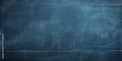 Blue blackboard or chalkboard background with texture of chalk school education board concept, dark wall backdrop or learning concept with copy space blank for design photo text or product 