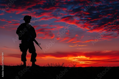 soldier's silhouette against the sky on sunset
