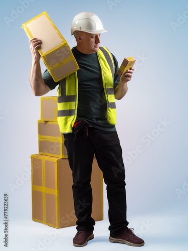Man loader with boxes. Guy ...