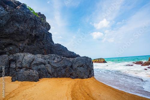 Summer quiet beach at Yanzi Cave, Qinwan, Wanning Mountain, Hainan, China photo