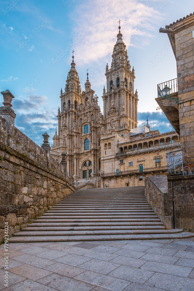 Santiago de Compostela Cathedral at sunrise, Galicia, Spain. Galician gothic church. Popular touristic landmark. Vertical orientation