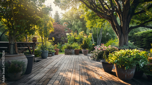 A serene backyard garden with a wooden deck and potted plants.