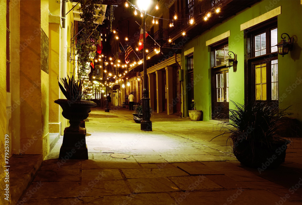 Obraz premium A quiet pedestrian only street at night in the New Orleans French Quarter