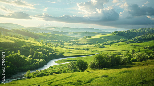 A picturesque countryside with rolling hills and a winding river. © CREATER CENTER