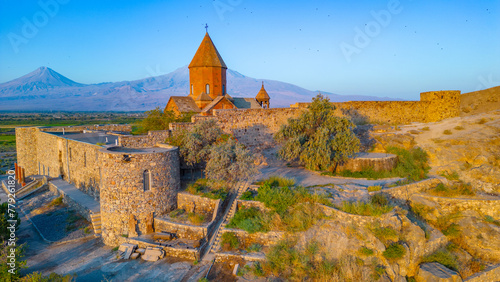 Sunrise view of Khor Virap Monastery standing in front of Ararat moutain in Armenia photo