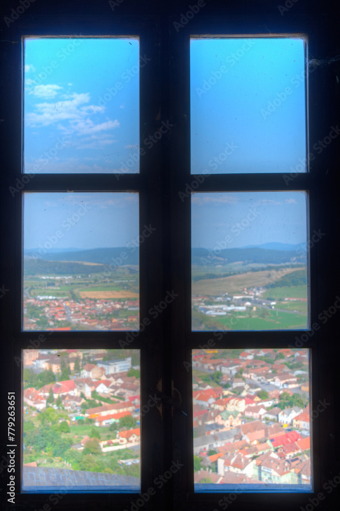 Fototapeta premium Panorama view of Romanian town Rupea thorugh window of the citadel