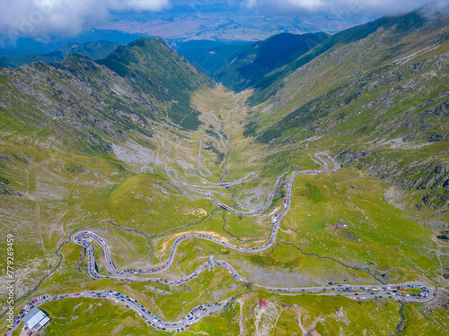 Transfagarasan road viewed during a sunny day in summer, Romania photo