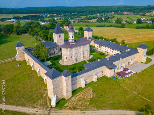 Dragomirna Monastery during a sunny day in Romania photo