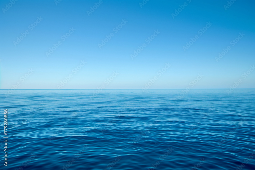 Calm sea and blue infinity, far horizon between blue sky and blue ocean water and copy space
