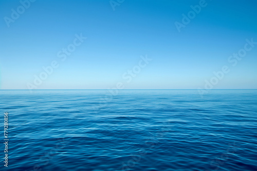 Calm sea and blue infinity, far horizon between blue sky and blue ocean water and copy space