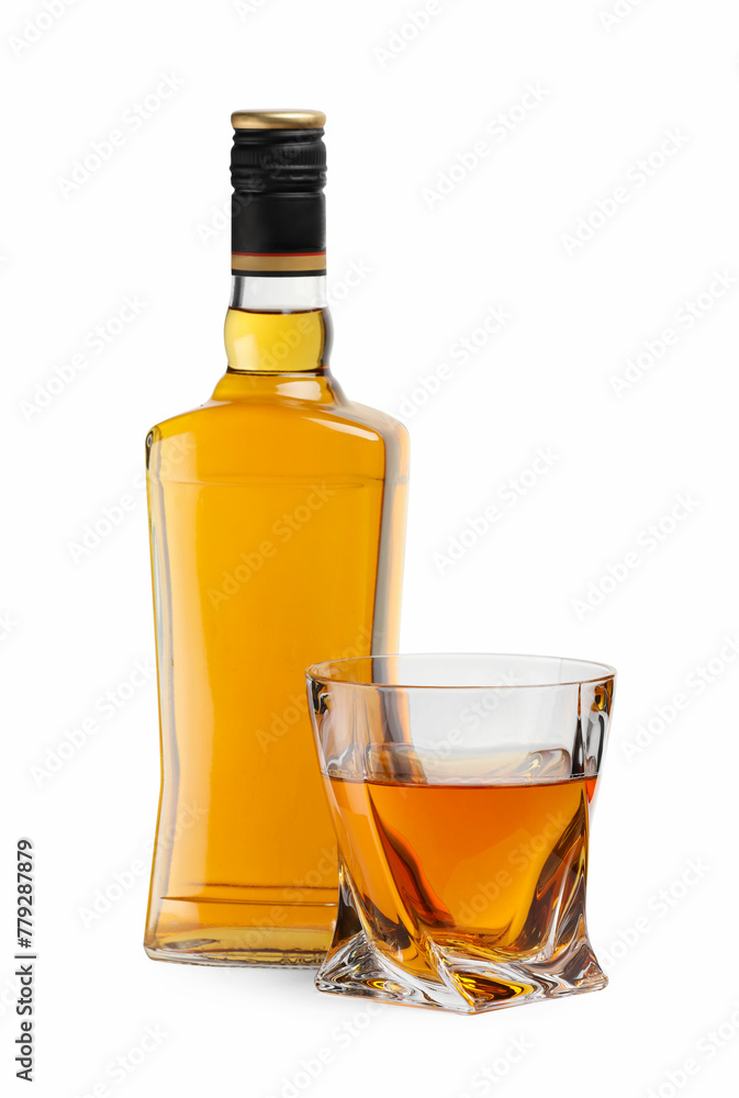 Glass and bottle of whiskey isolated on white Glass and bottle of whiskey isolated on white