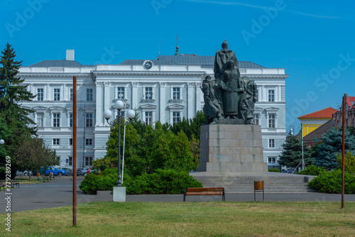 Heroes monument and Ioan Slavici Classical Theater in Romanian town Arad photo