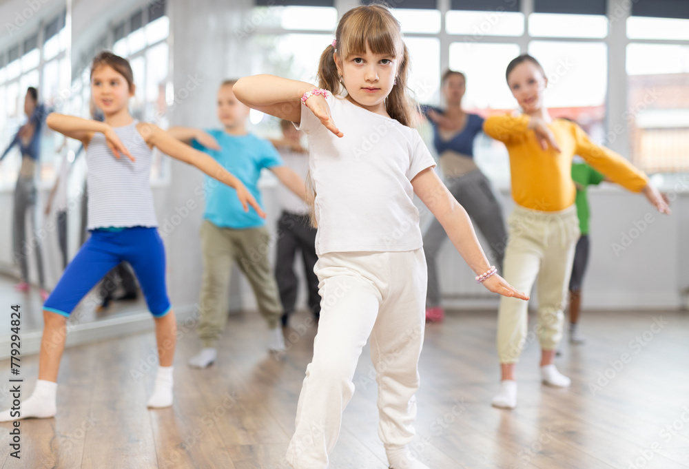 Fototapeta premium Group of children boys and girls dance modern dance in studio