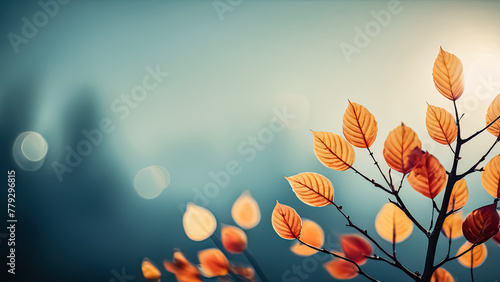 Abstract Autumn Nature Background with Leaves on a Branch and Glowing Sun