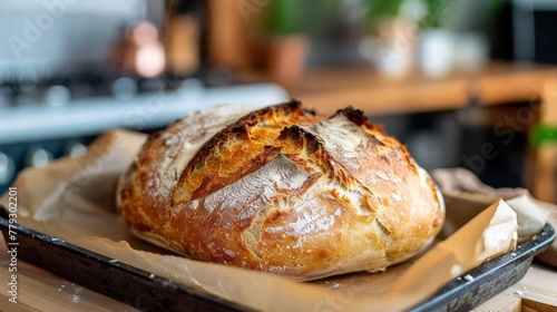 Artisan Crusty Bread Freshly Baked on Wooden Cutting Board in Rustic Kitchen Setting