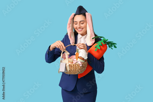 Happy stewardess in bunny e...