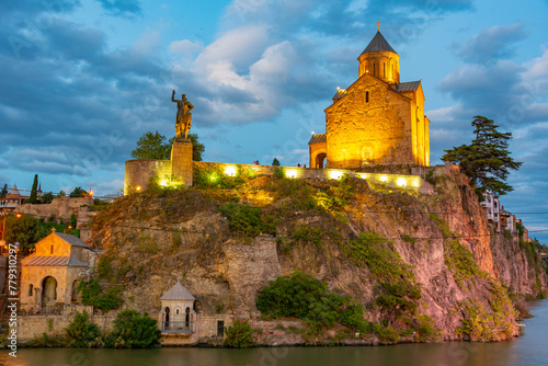 Sunset view of Metekhi Virgin Mary Assumption Church in Tbilisi, Georgia photo