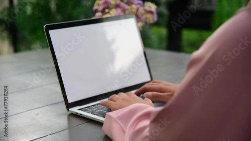 Wallpaper Mural Muslim woman wear hijab work from home office typing laptop keyboard on wooden desk with office supply happy smiling face. Young Asian arabian muslim women working summary report business graph chart Torontodigital.ca