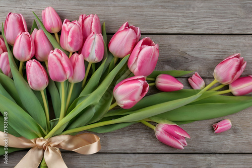 bouquet of tulips on a wooden background
