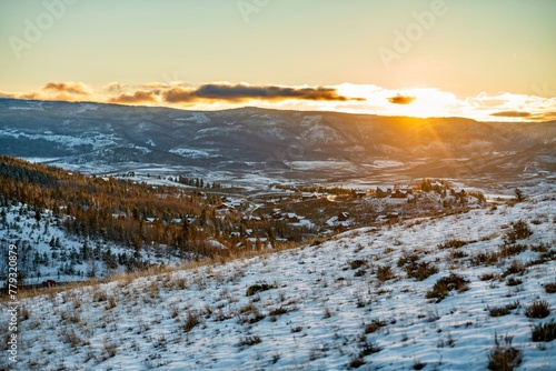 Sunset over the village in Colorado Rocky Mountains, winter snow
