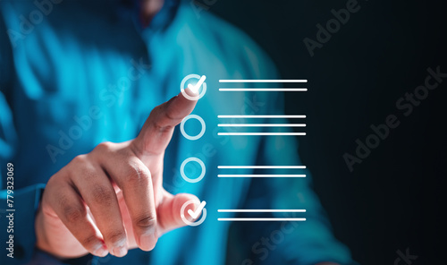 choice, checkbox, document, management, option, plan, mark, list, survey, tick. A man is pointing at a screen with a check mark on it, and pressing button to check off the item he wants to do.