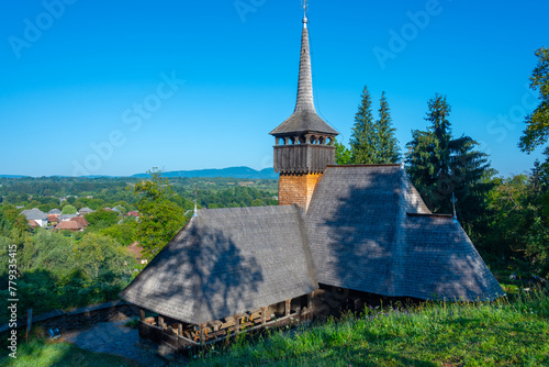 The wooden church from Calinesti Caeni at Calinesti, Romania photo