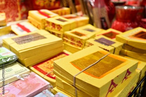Taiwan - Jan 18, 2024: Hell money, also called spirit money, is paper burned as an offering to ancestors in Chinese worship. It's believed to provide them with what they need in the afterlife.