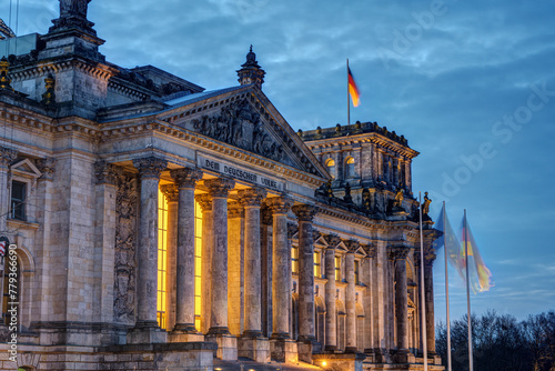 The entrance portal of the Reichstag in Berlin at twilight