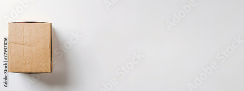 A cardboard box on a white background with ample copy space.