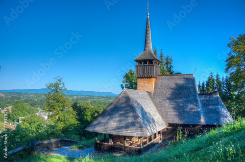 The wooden church from Calinesti Caeni at Calinesti, Romania photo