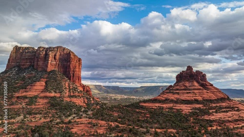 Clouds over Bell Rock And Courthouse Butte In Sedona, Arizona, USA. - aerial hyperlapse photo