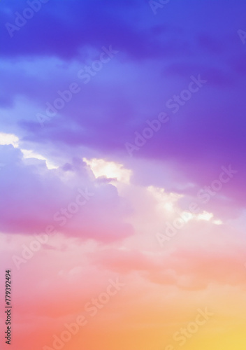 Sky midday sunlight beams rainbow pastel gradient pale orange-pink purple-blue dramatic. Beautiful sunny day soft light clouds blur background. © squallice