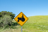 sign slow tractor pay attention