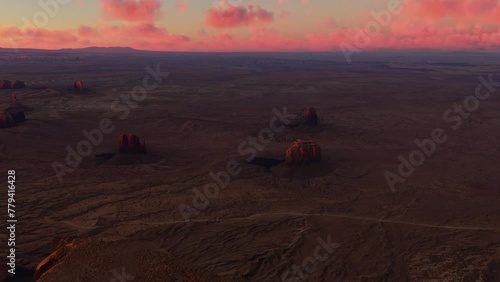 Sunset aerial view of Merrick Butte - East Mitten Butte - West Mitten Butte desert in Arizona. United States photo