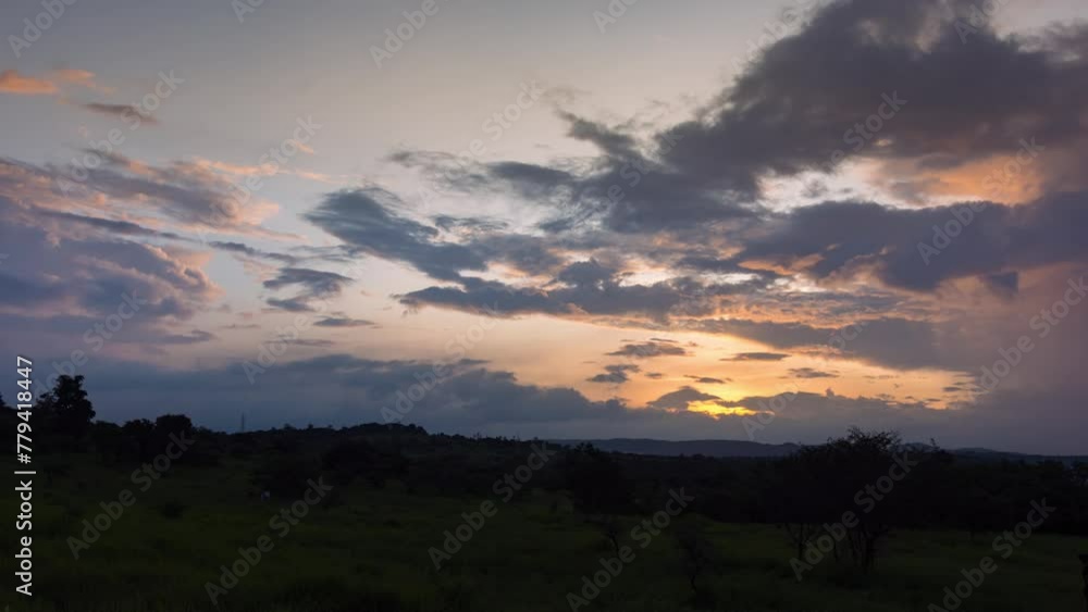 Timelapse - Sunset behind mountains and clouds with colour explosion 4K30 Timelapse - Sunset behind mountains and clouds with colour explosion 4K30
