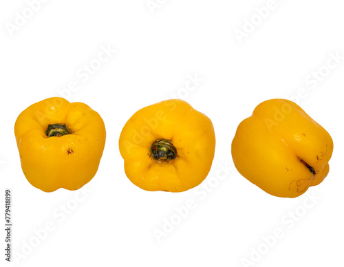 Set of fresh whole and yellow sweet pepper isolated on white background. Top view