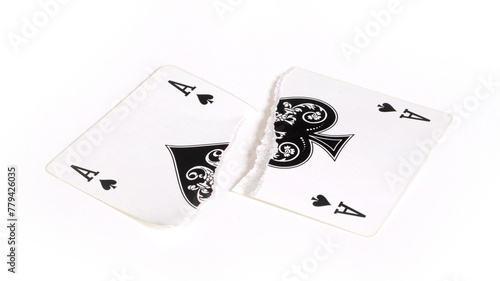 Playing card, torn in pieces
