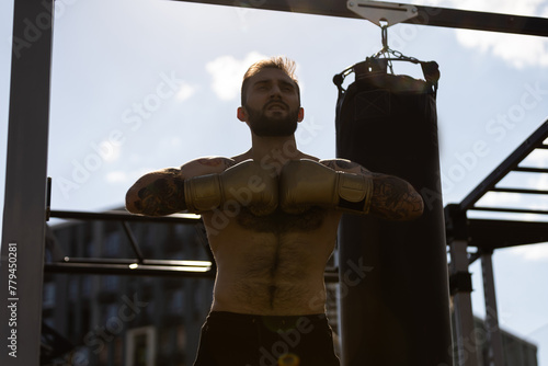 A fighter in the boxing gloves concept portrait