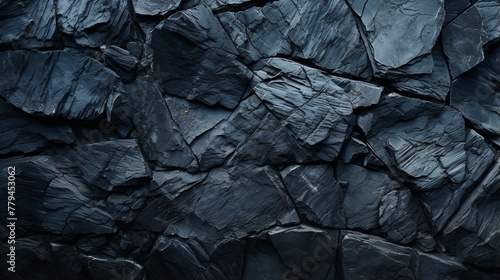 Background of black stone wall texture. Black stone wall texture background. photo